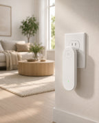 White PestCalm plugged into a living room outlet